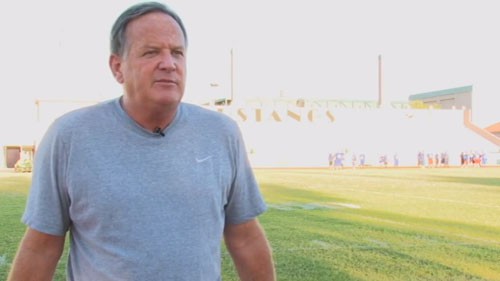 New football coach, Bernie Bunsken, is already influencing the lives of players on and off the field. <b>Elle Johns</b> with Cronkite News shows us how Bunsken is giving new hope to the school.